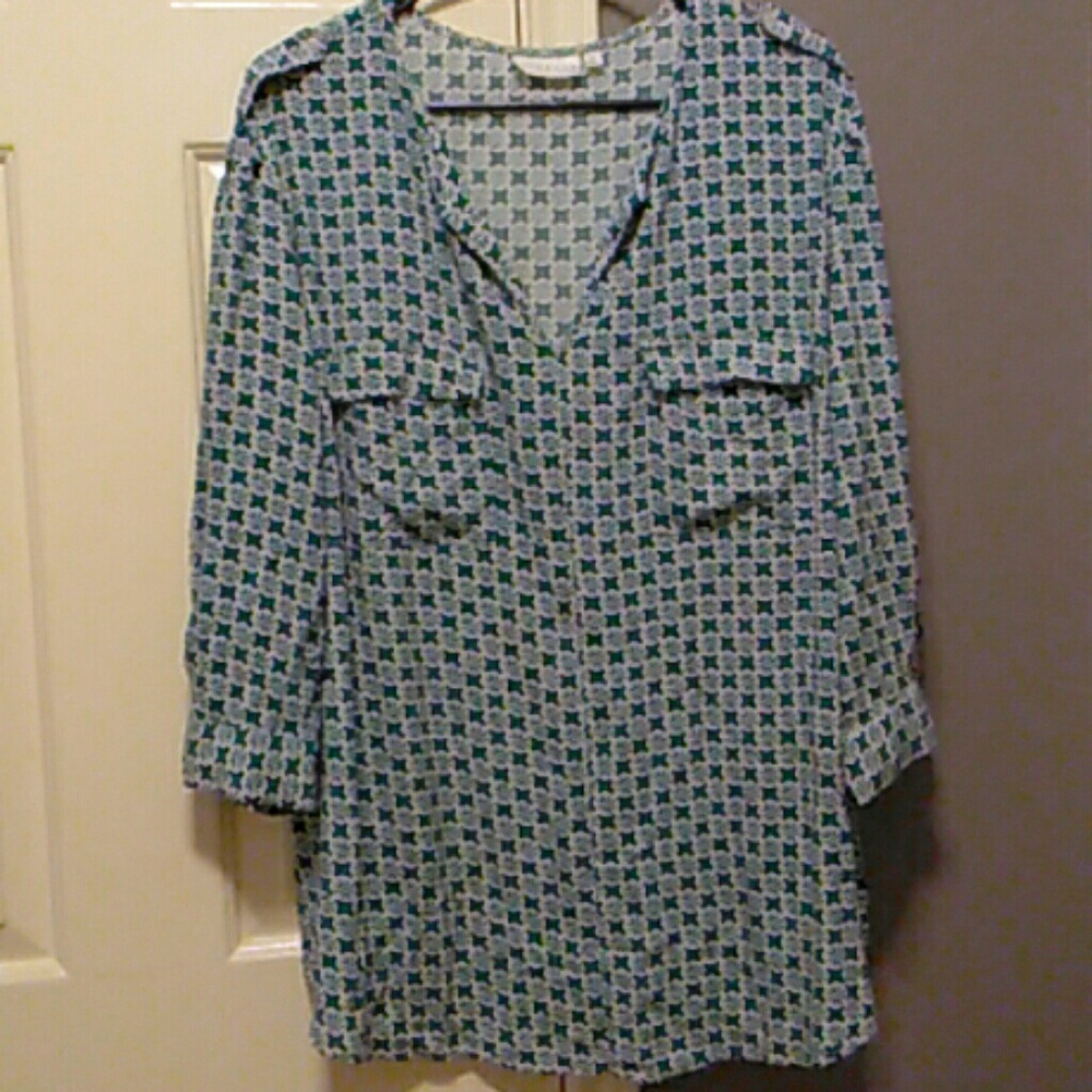 Quarter sleeve loose and flowy blouse
